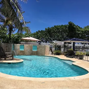 https://the-beach-club-guest-house.greaterantilleshotels.net